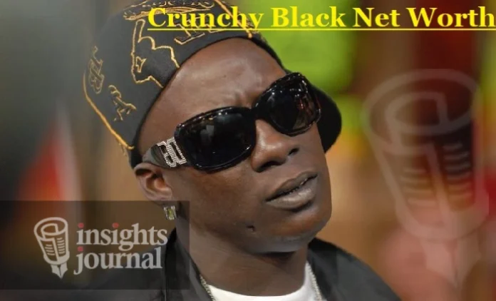 Crunchy Black net worth 2024 - Three 6 Mafia member performing on stage