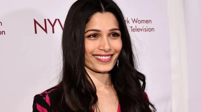freida pinto net worth Freida Pinto at a red carpet event, representing her $14 million net worth and successful Hollywood career.