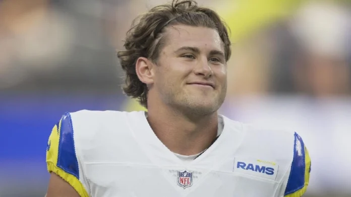 Jake Funk smiling on the football field, representing his success and rising fortune — perfect image to highlight Jake Funk net worth in 2025.