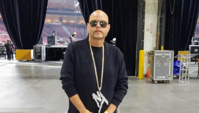 raul conde net worth Raul Conde posing confidently with a backdrop of music awards and urban luxury—symbolizing his career and Raul Conde Net Worth journey.