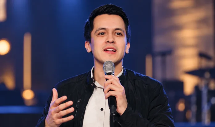 David Diga Hernandez speaking at a Christian ministry event